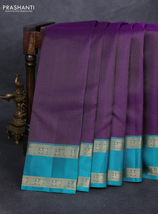 Pure soft silk saree purple and teal green with allover zari woven brocade weaves and rettapet zari woven border