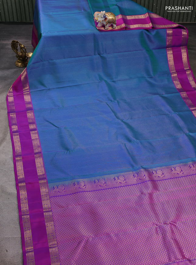 Pure soft silk saree dual shade of bluish green and purple with allover zari woven brocade weaves and rettapet zari woven border