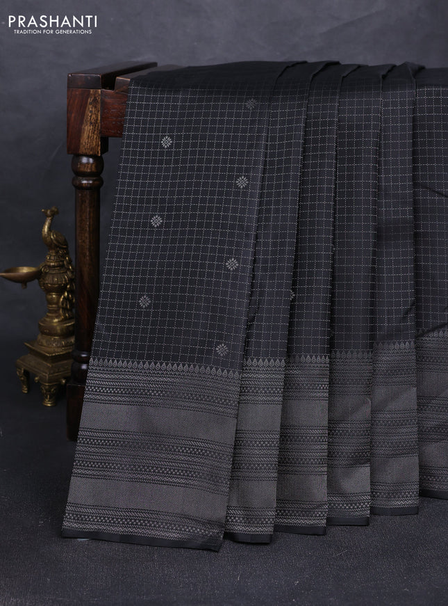 Pure soft silk saree black with allover silver zari checks & buttas and long silver zari woven border