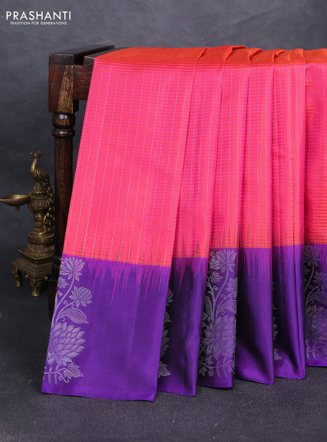 Pure soft silk saree dual shade of pinkish orange and violet with allover silver zari stripe pattern and long silver zari woven butta border