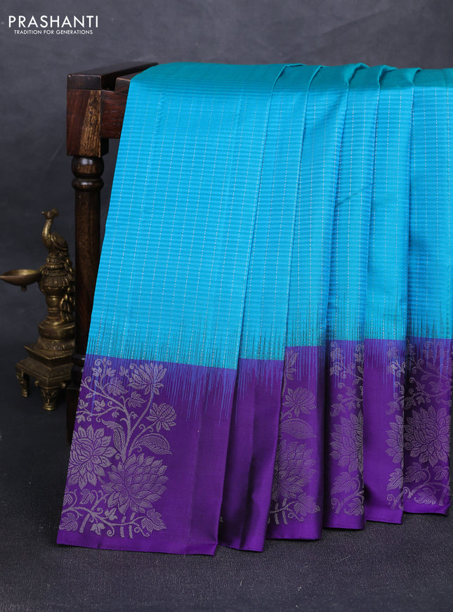 Pure soft silk saree teal blue and violet with allover silver zari stripe pattern and long silver zari woven butta border