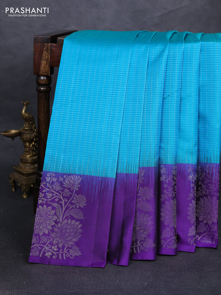 Pure soft silk saree teal blue and violet with allover silver zari stripe pattern and long silver zari woven butta border