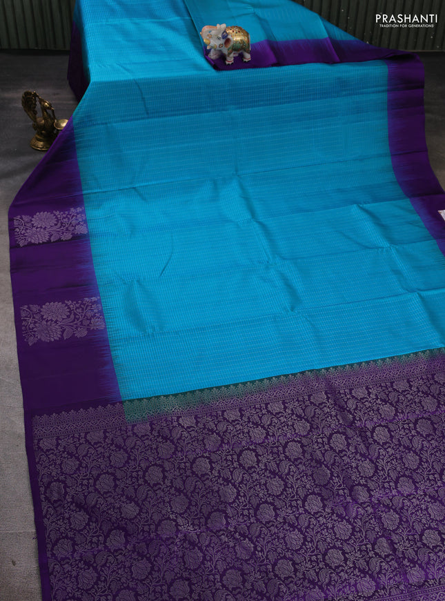 Pure soft silk saree teal blue and violet with allover silver zari stripe pattern and long silver zari woven butta border