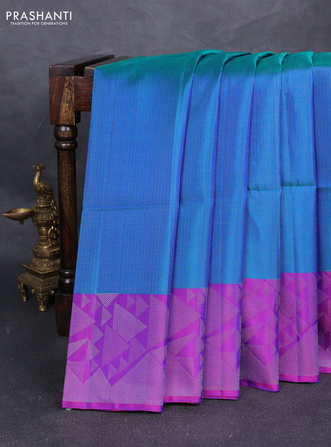 Pure soft silk saree dual shade of bluish green and purple with allover silver zari woven brocade weaves and silver zari woven border