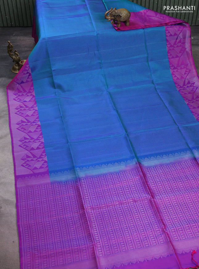 Pure soft silk saree dual shade of bluish green and purple with allover silver zari woven brocade weaves and silver zari woven border
