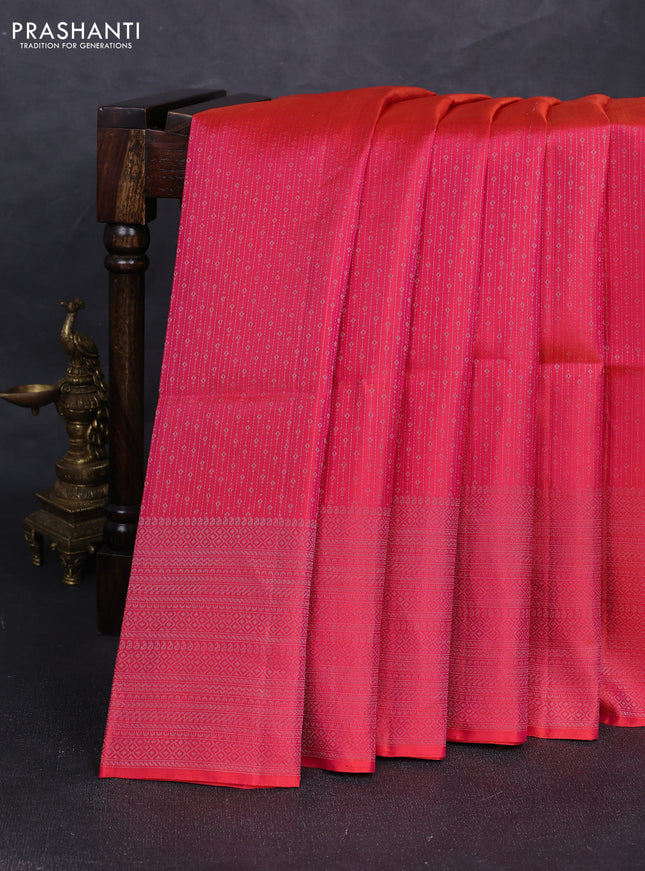 Pure soft silk saree dual shade of pinkish orange with allover silver zari woven brocade weaves and silver zari woven border