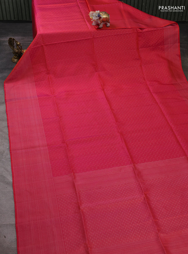Pure soft silk saree dual shade of pinkish orange with allover silver zari woven brocade weaves and silver zari woven border
