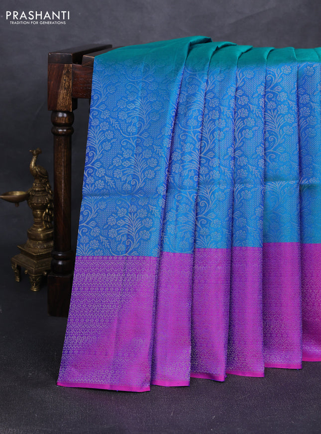 Pure soft silk saree dual shade of bluish green and purple with allover silver zari woven brocade weaves and silver zari woven border