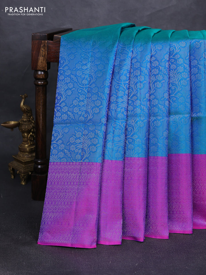 Pure soft silk saree dual shade of bluish green and purple with allover silver zari woven brocade weaves and silver zari woven border