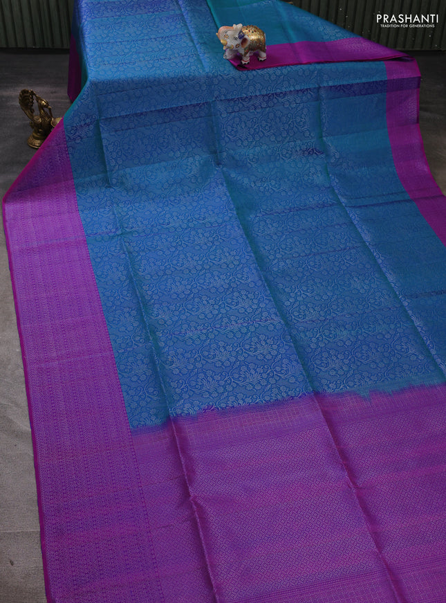 Pure soft silk saree dual shade of bluish green and purple with allover silver zari woven brocade weaves and silver zari woven border