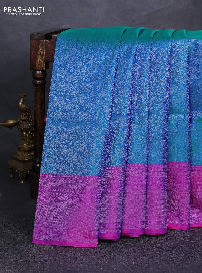 Pure soft silk saree dual shade of bluish green and purple with allover silver zari woven brocade weaves and silver zari woven border
