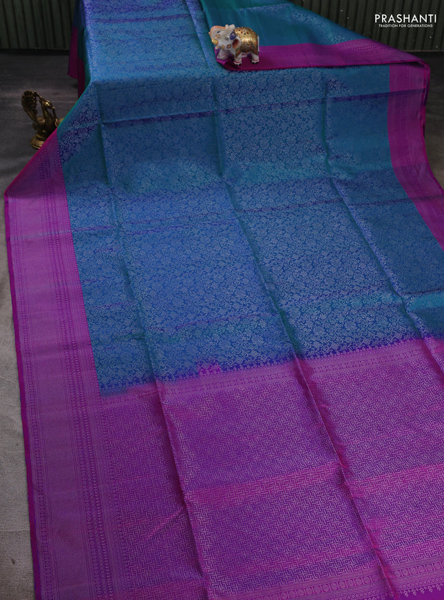 Pure soft silk saree dual shade of bluish green and purple with allover silver zari woven brocade weaves and silver zari woven border