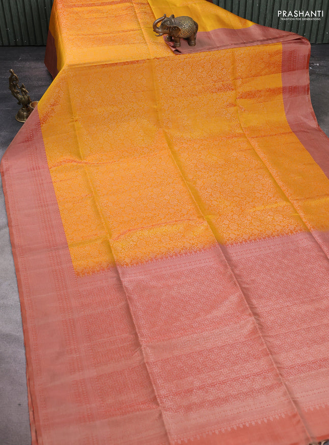 Pure soft silk saree yellow and rust shade with allover silver zari woven brocade weaves and silver zari woven border