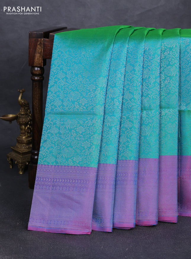 Pure soft silk saree dual shade of teal bluish green and dual shade of blue with allover silver zari woven brocade weaves and silver zari woven border