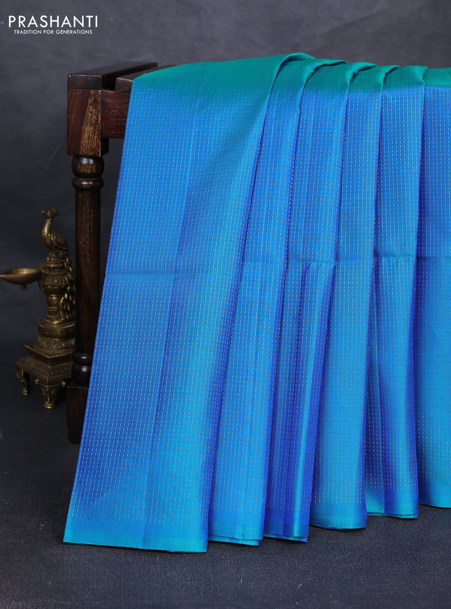 Pure soft silk saree dual shade of bluish green with allover zari stripe pattern in borderless style