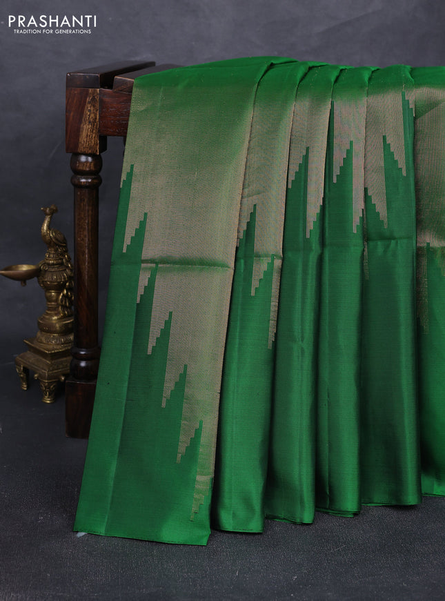 Pure soft silk saree green with allover zari weaves and temple design simple border
