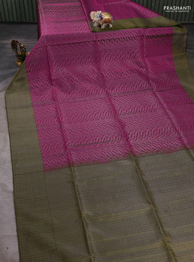 Pure soft silk saree purple and mehendi green with allover silver zari woven brocade weaves and silver zari woven border