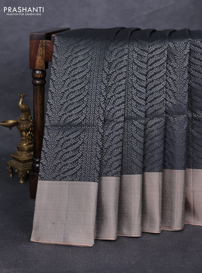 Pure soft silk saree black and chikku shade with allover silver zari woven brocade weaves and silver zari woven border