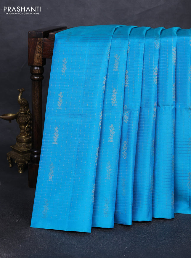 Pure soft silk saree cs blue and purple with allover checked pattern & zari buttas in borderless style
