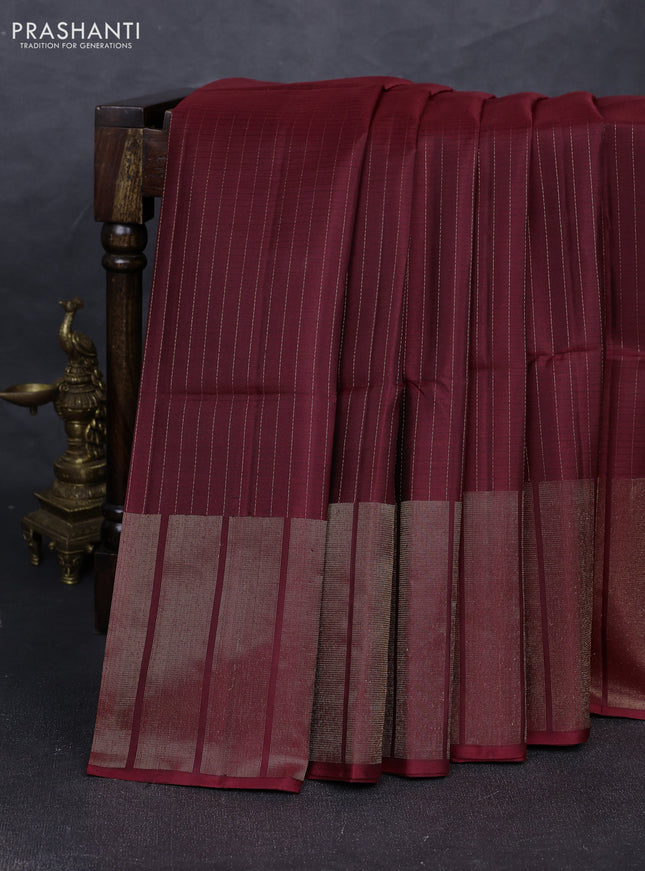 Pure soft silk saree maroon with allover zari stripe pattern and long zari woven border