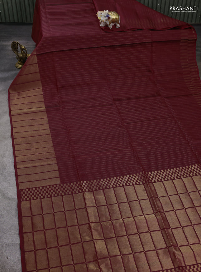 Pure soft silk saree maroon with allover zari stripe pattern and long zari woven border