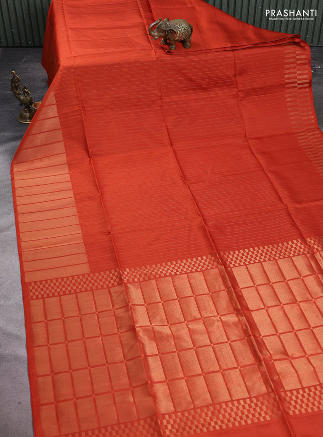 Pure soft silk saree rustic orange with allover zari stripe pattern and long zari woven border