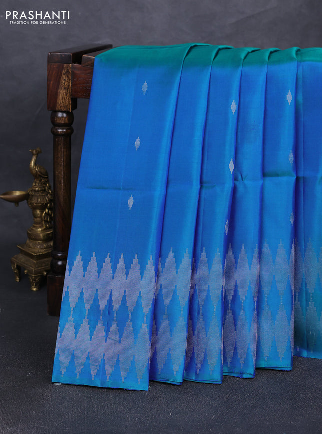 Pure soft silk saree dual shade of bluish green with allover silver zari woven buttas and silver zari woven border