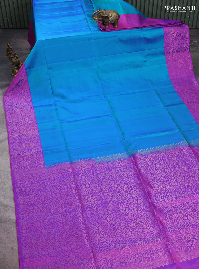 Pure soft silk saree dual shade of greenish blue and purple with plain body and zari woven border