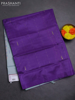 Banana pith saree violet and pastel blue with thread woven buttas in borderless style