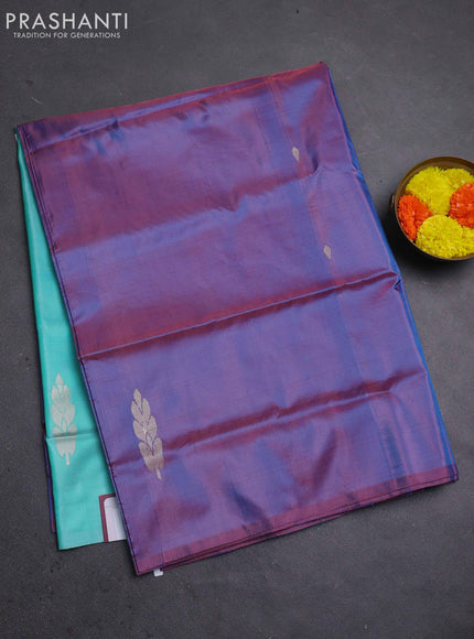 Banana pith saree dual shade of purple and teal blue with thread woven buttas in borderless style
