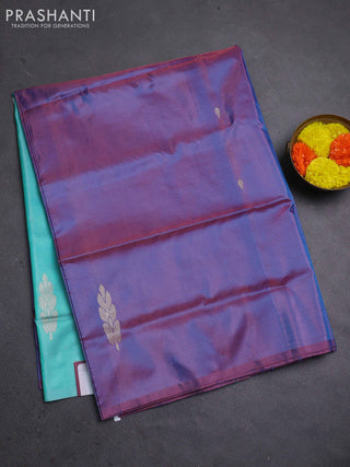 Banana pith saree dual shade of purple and teal blue with thread woven buttas in borderless style