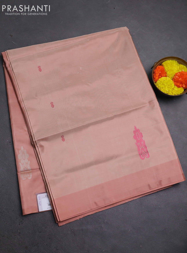 Banana pith saree sandal and peach shade with thread woven buttas and contrast border