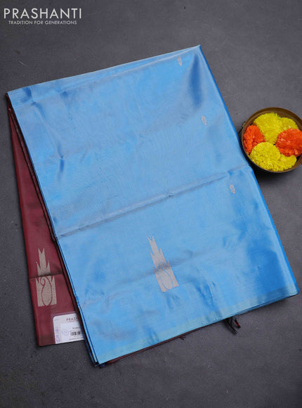 Banana pith saree light blue and maroon with thread woven buttas in borderless style