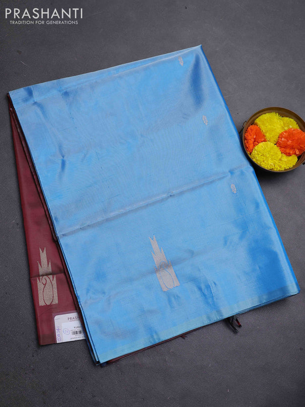 Banana pith saree light blue and maroon with thread woven buttas in borderless style