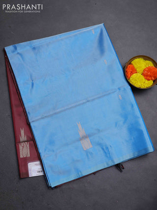 Banana pith saree light blue and maroon with thread woven buttas in borderless style