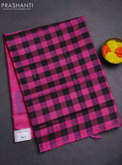 Banana pith saree black and pink with allover checked pattern in borderless style