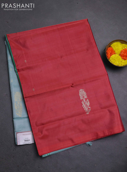 Banana pith saree maroon and pastel blue with thread woven buttas in borderless style