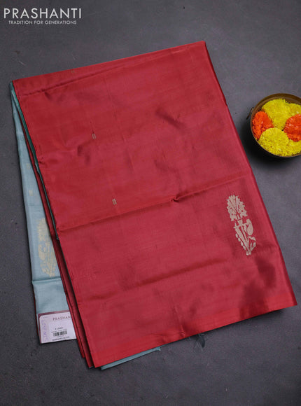 Banana pith saree red and pastel blue with thread woven buttas in borderless style