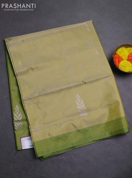 Banana pith saree mild pista green and mehendi green with thread woven buttas and contrast border