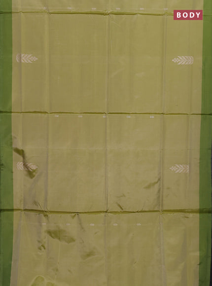 Banana pith saree mild pista green and mehendi green with thread woven buttas and contrast border
