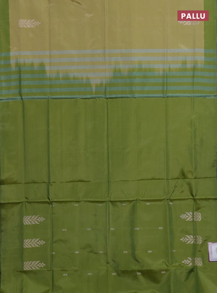 Banana pith saree mild pista green and mehendi green with thread woven buttas and contrast border