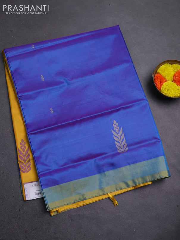 Banana pith saree cs blue and mango yellow with thread woven buttas and contrast border