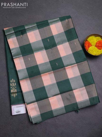 Banana pith saree peach shade and dark green with allover checked pattern in borderless style