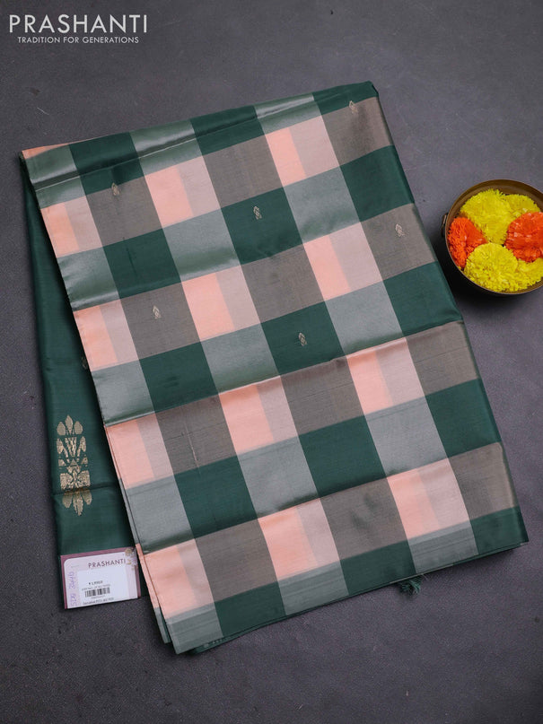 Banana pith saree peach shade and dark green with allover checked pattern in borderless style