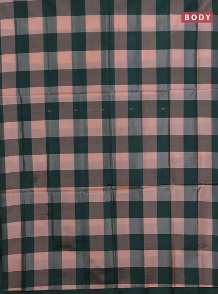 Banana pith saree peach shade and dark green with allover checked pattern in borderless style