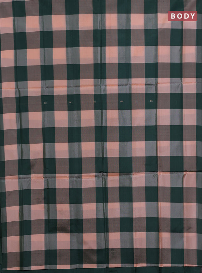 Banana pith saree peach shade and dark green with allover checked pattern in borderless style