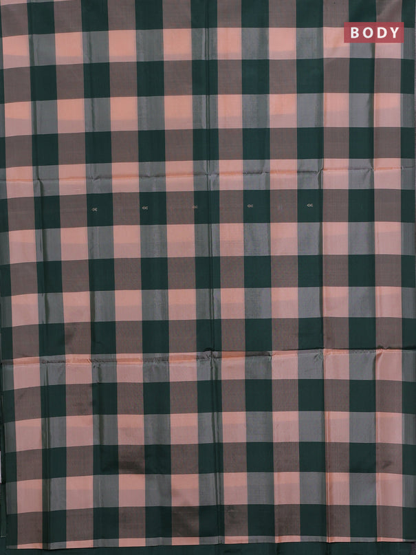 Banana pith saree peach shade and dark green with allover checked pattern in borderless style