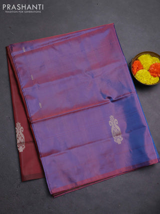 Banana pith saree dual shade of blue and maroon with thread woven buttas in borderless style