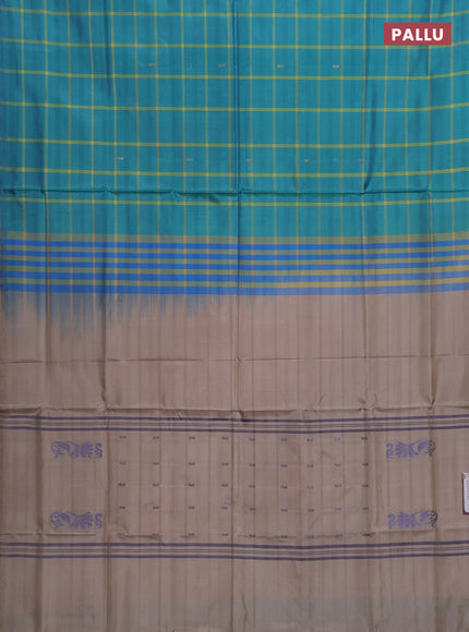 Banana pith saree teal green and beige with allover checked pattern in borderless style