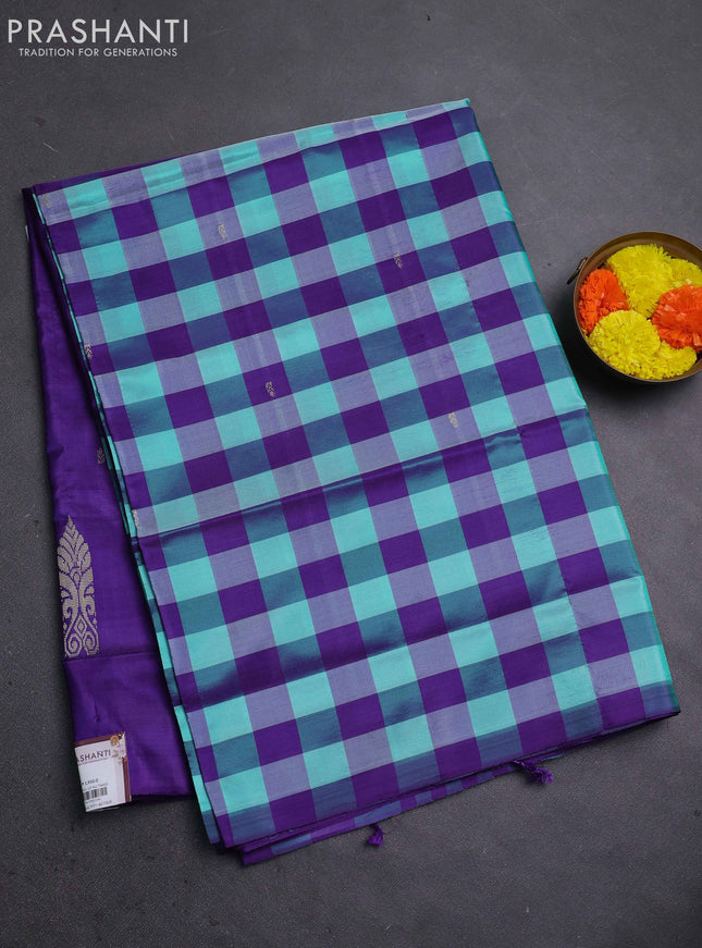 Banana pith saree teal green and violet with allover checked pattern in borderless style